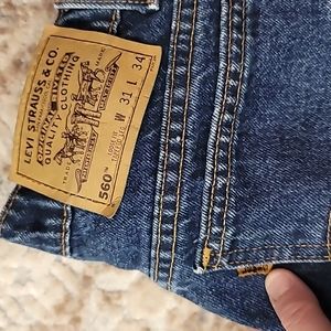 Vintage 90's orange tab Levi's 560 loose fit tapered leg jeans size 31x34